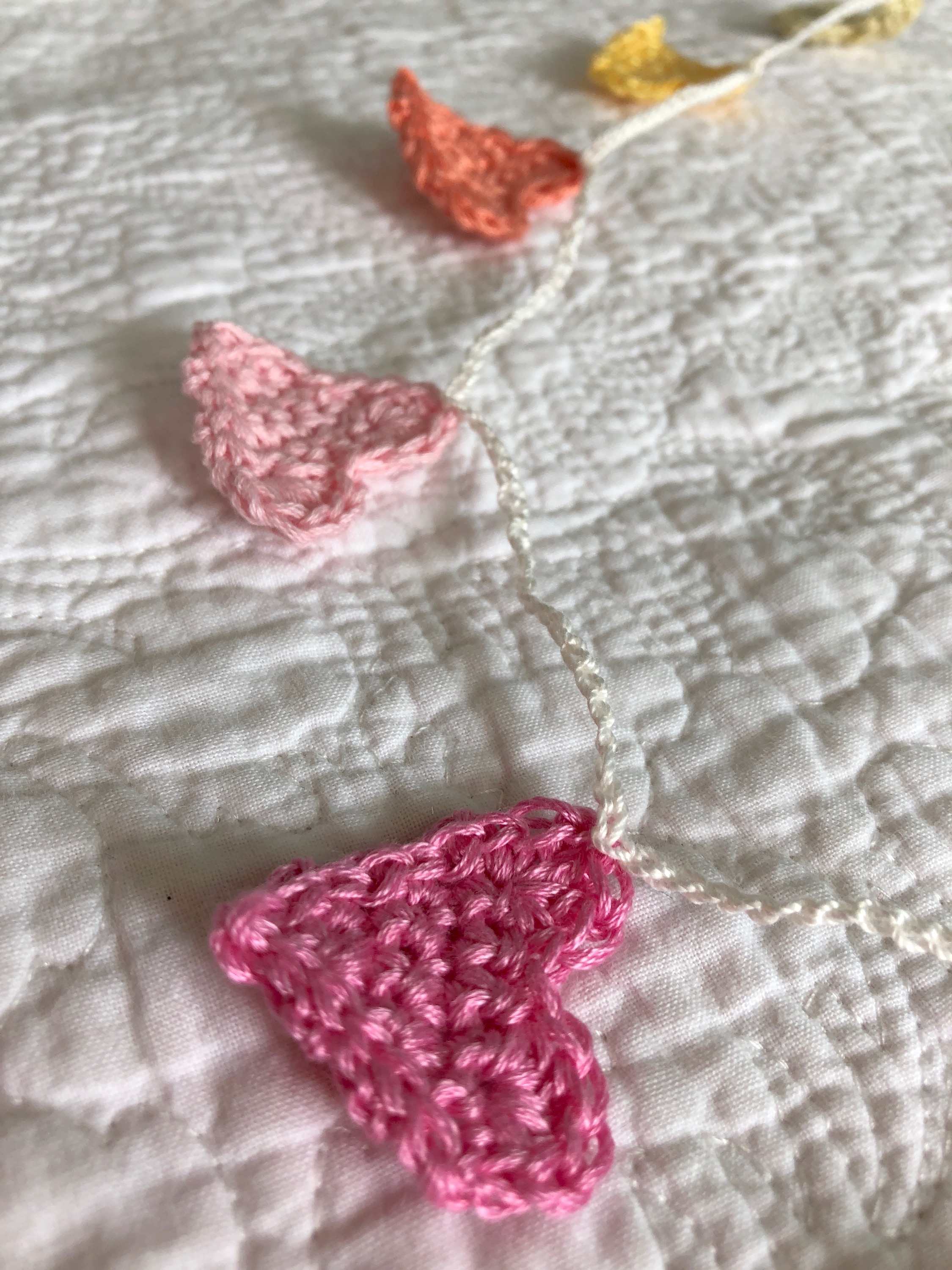 Tiny crocheted hearts bunting.