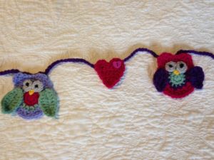 Crocheted owl bunting.