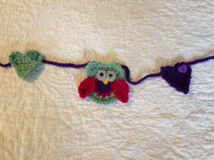 Crocheted owl bunting.
