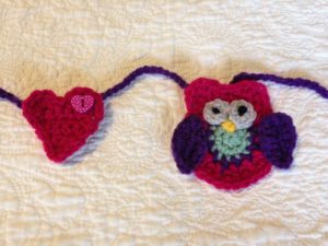 Crocheted owl bunting.