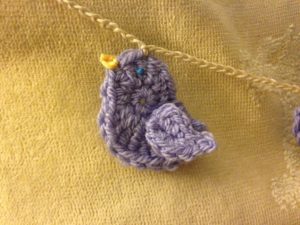 Crocheted little bird bunting.