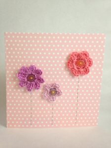 Pink flowers, hand stitched and crocheted greetings card.