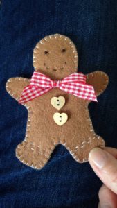 Gingerbread man, felt, had stitched, hanging decoration.