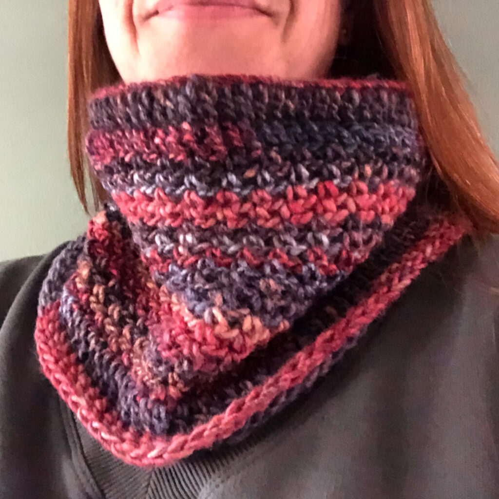 Handmade, crocheted neck warmer in a variegated colour combination. Made using a chunky and warm Wool/Acrylic mix yarn.