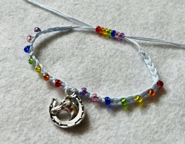 Horse charm and rainbow glass bead bracelet. - Image 2