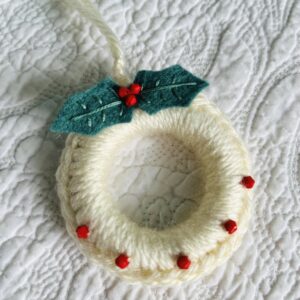 Mini wreath with holly and beading.