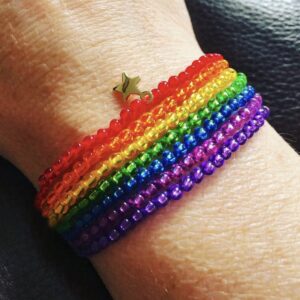 A 7 stranded bracelet made in the colours of the rainbow with a gold star charm. Fully adjustable. Made from 100% Cotton, glass beads and metal charm/fixings. Eco-friendly, Vegan Friendly and completely recyclable. No Plastic!