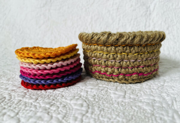 A small handmade, crocheted, jute and cotton basket containing 7 reusable facial rounds. Each facial round is made using 100% cotton in a selection of beautiful colours. They are wonderfully soft with a delicate texture. Kind on the skin and the environment.