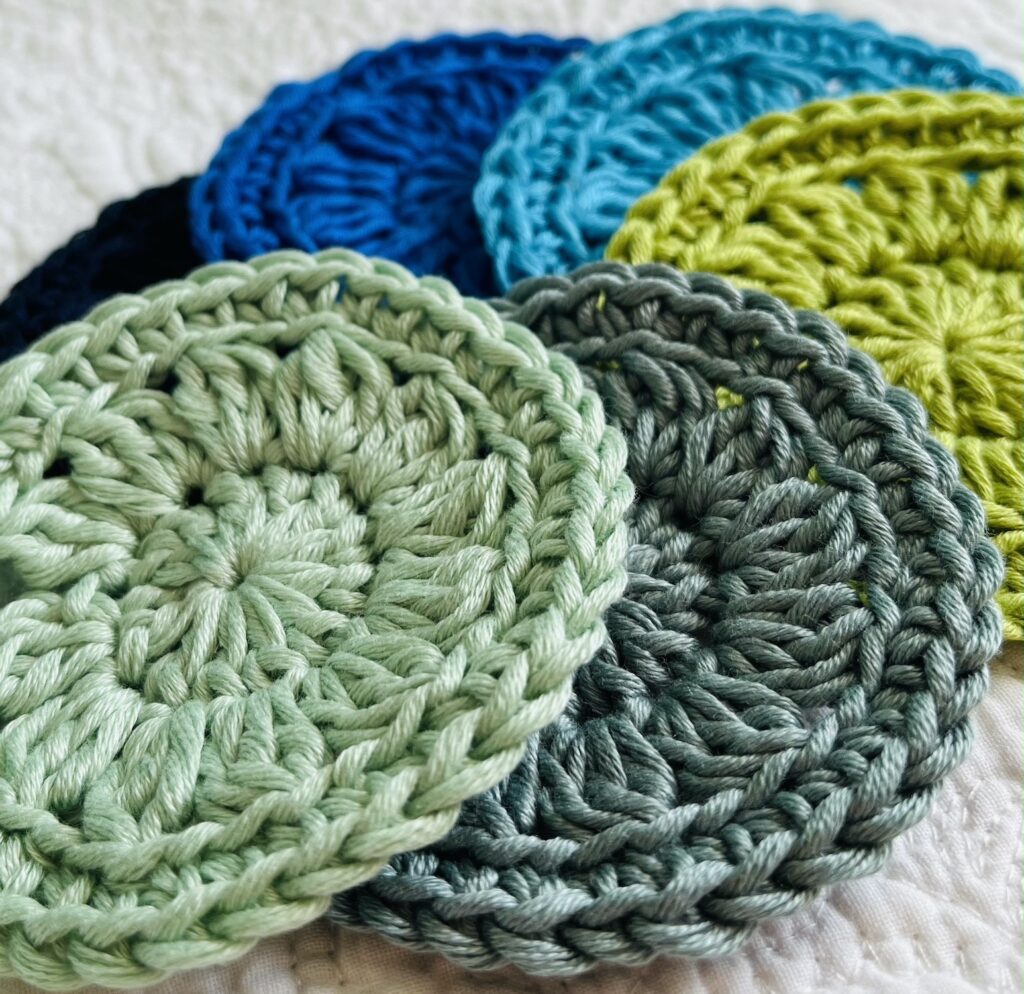 A sea of green and blue facial rounds. Handmade using 100% cotton. Eco-Friendly and vegan friendly.