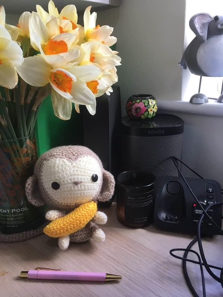 A little crocheted amigurumi monkey. Pattern by All About Ami.