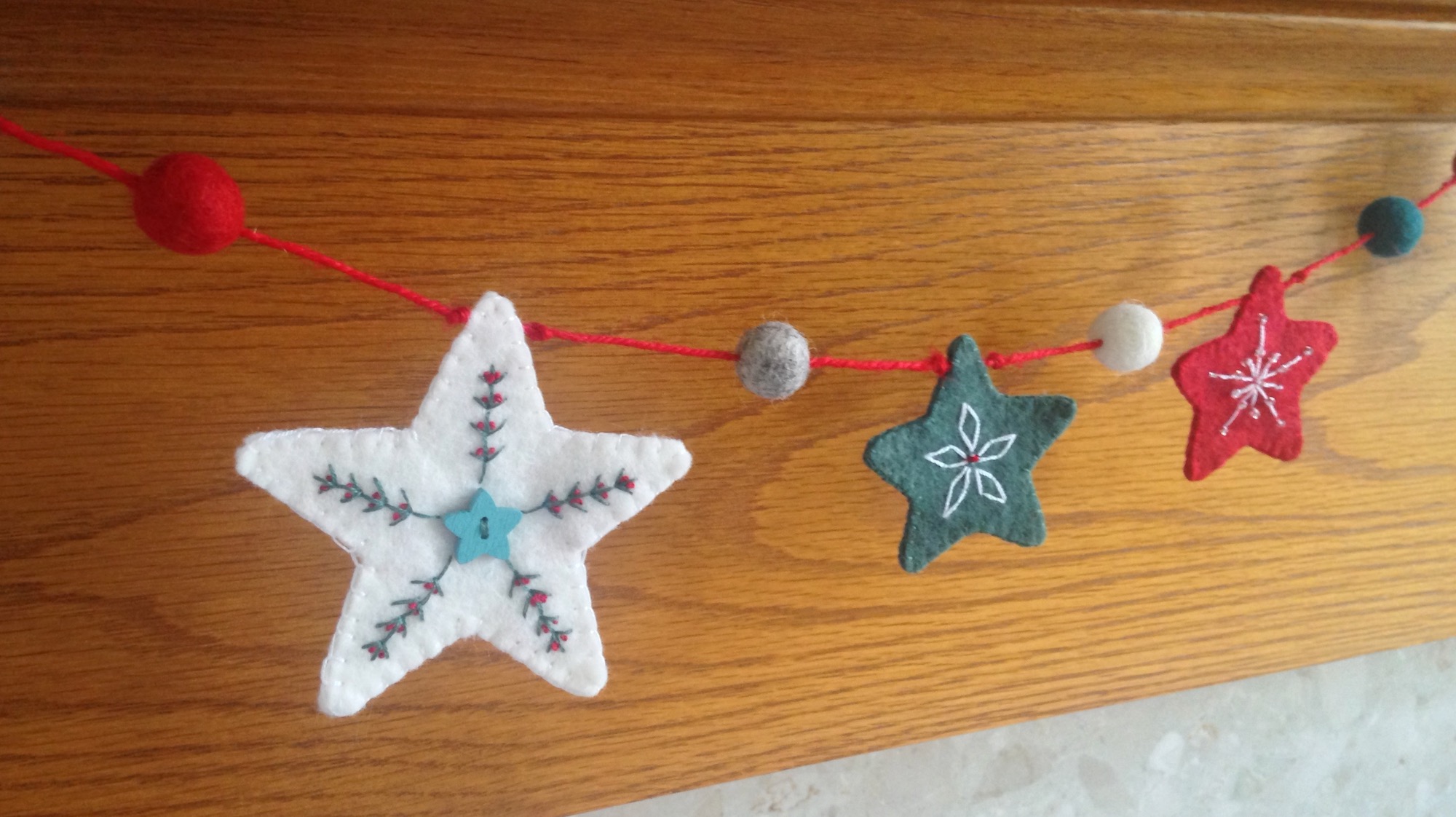 Scandinavian inspired, hand embroidered, felt star garland.