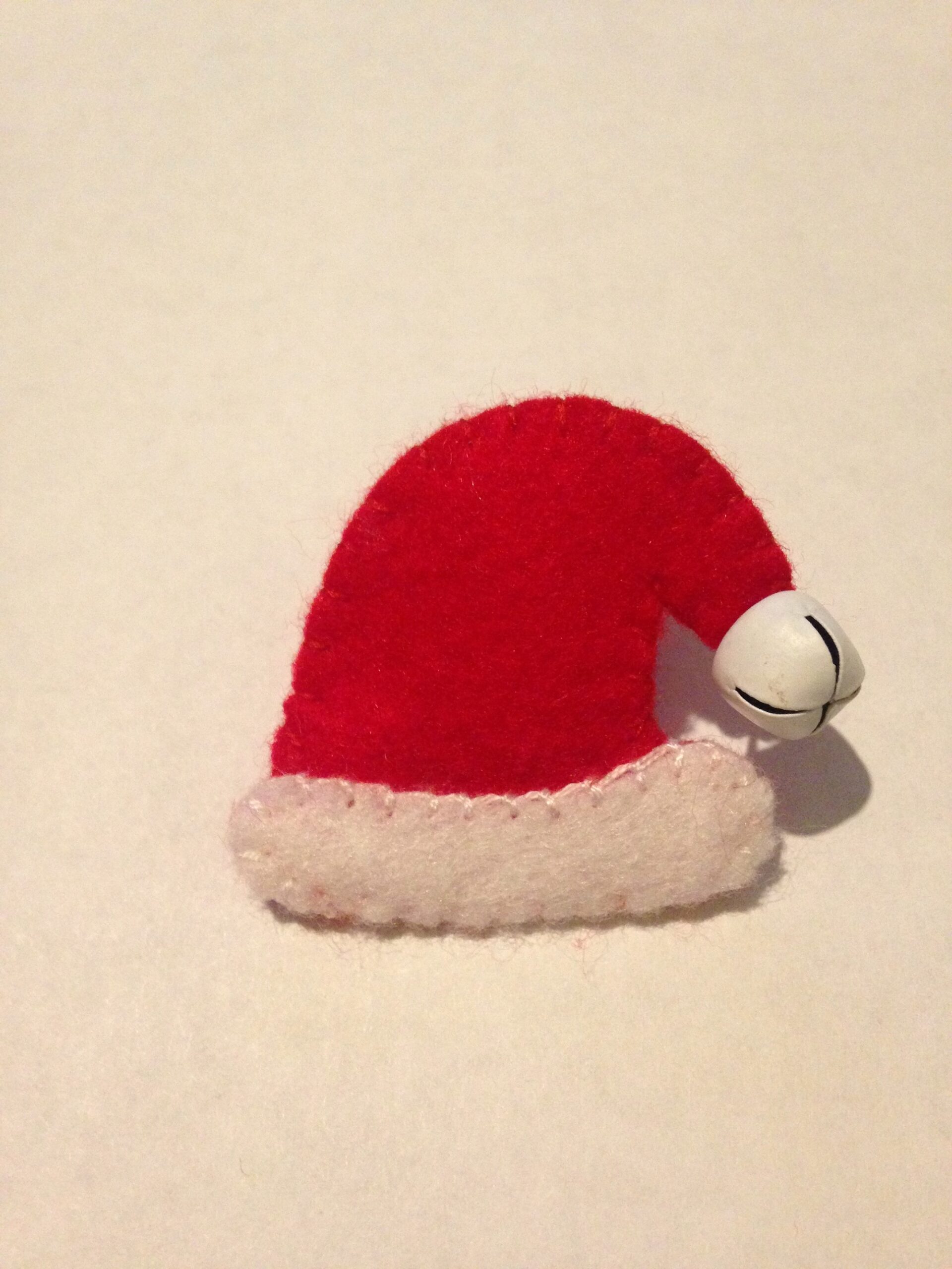 Santa hat brooch.