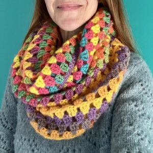 A handmade, crocheted double wrap around infinity scarf in a mix of spring inspired colours. Made using a beautifully lightweight and soft 80% acrylic and 20% wool mix yarn.