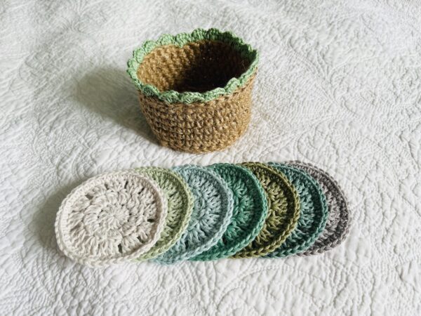 A small handmade, crocheted, jute and cotton basket containing 7 reusable facial rounds. Each facial round is made using 100% cotton in a selection of beautiful colours. They are wonderfully soft with a delicate texture. Kind on the skin and the environment.