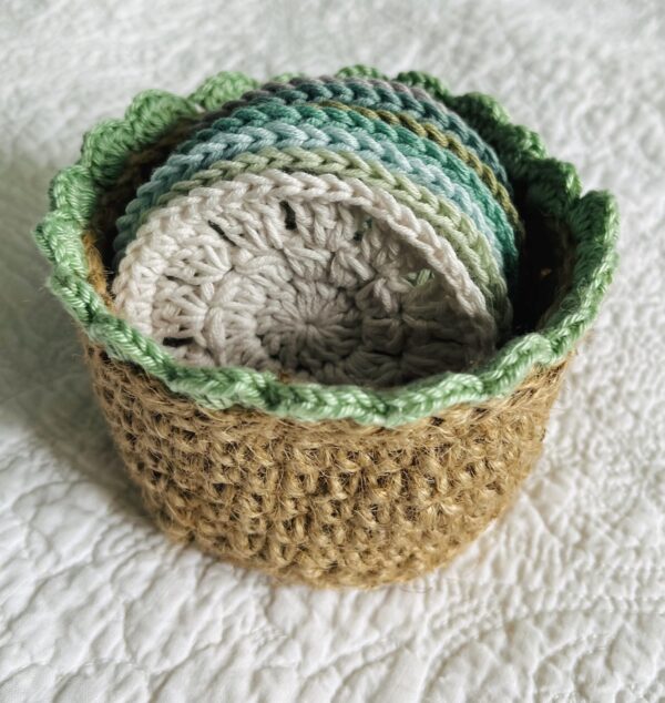 A small handmade, crocheted, jute and cotton basket containing 7 reusable facial rounds. Each facial round is made using 100% cotton in a selection of beautiful colours. They are wonderfully soft with a delicate texture. Kind on the skin and the environment.