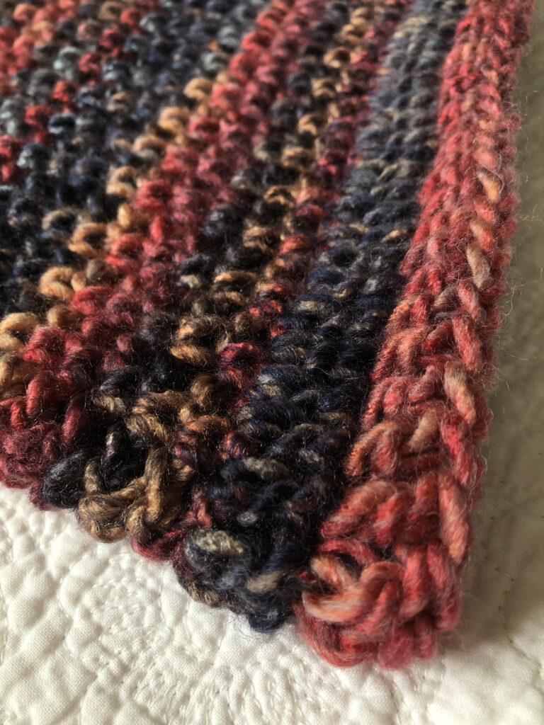 Handmade, crocheted neck warmer in a variegated colour combination. Made using a chunky and warm Wool/Acrylic mix yarn.