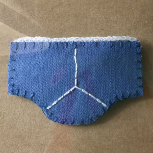 Positive pants brooch.