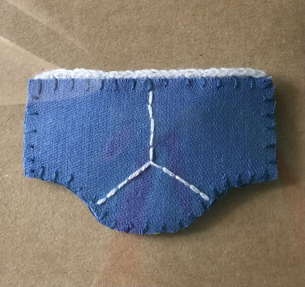 Positive pants brooch.