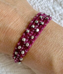 5 stranded, fully adjustable, glass and metal beaded bracelet Made from 100% Cotton and glass and metal beads. No plastic! Eco-friendly, vegan friendly and completely recyclable.