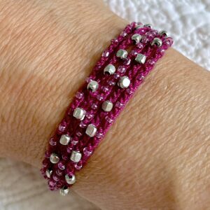 5 stranded, fully adjustable, glass and metal beaded bracelet Made from 100% Cotton and glass and metal beads. No plastic! Eco-friendly, vegan friendly and completely recyclable.