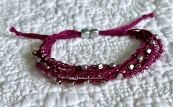 5 stranded, fully adjustable, glass and metal beaded bracelet Made from 100% Cotton and glass and metal beads. No plastic! Eco-friendly, vegan friendly and completely recyclable.